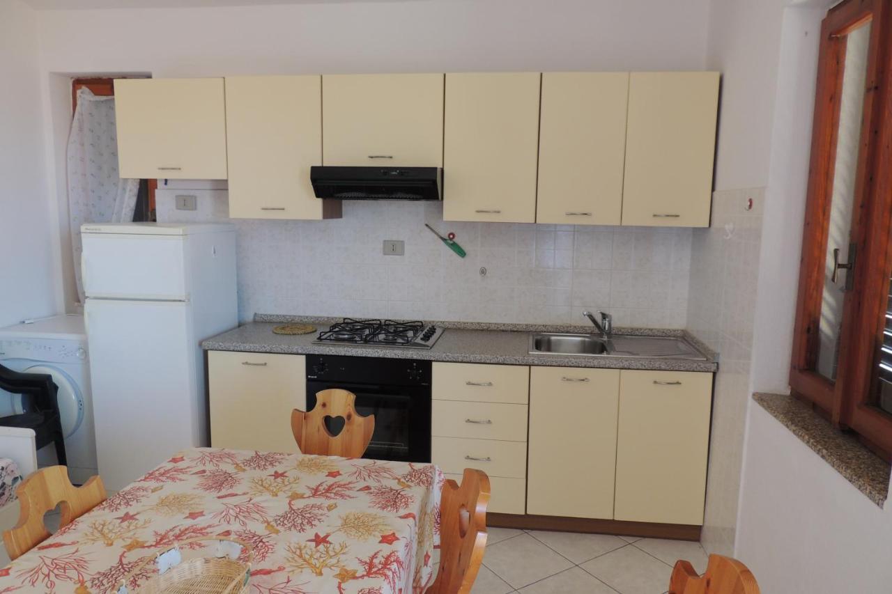 Borgo Spiaggia Vista Mare Изола-Росса Экстерьер фото